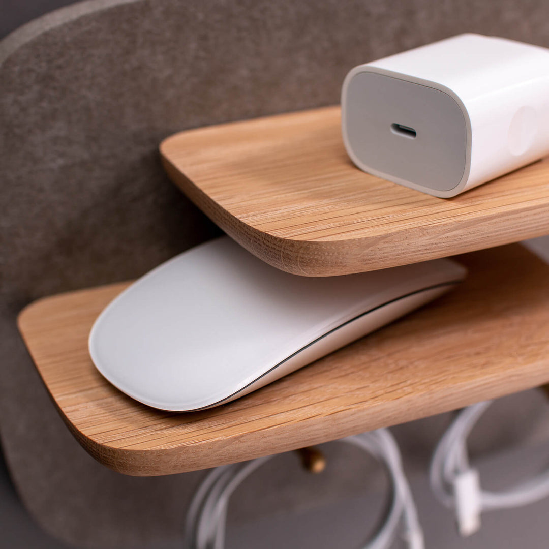 Detail pic with Apple Mouse, USB cables and charger on oak wood wall shelving of the Mantel Pegboard, Pebble / 2Peg Shelf