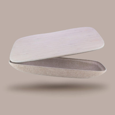 Lapod lap desk with storage limited edition colour bamboo lap tray. Floating, open over wheat background. Grain / Oatmeal